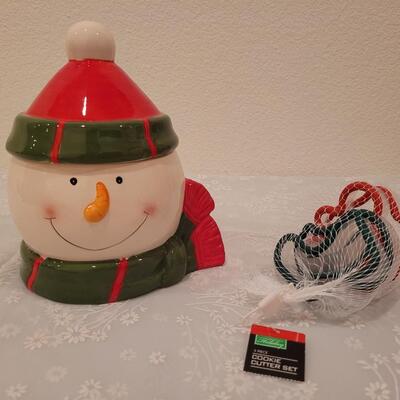 Lot 183: Snowman Cookie Jar and Holiday Cookie Cutters