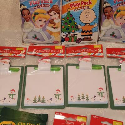 Lot 197: Christmas Basket and Children's Activity Packs, Erasers and Dry Erase Boards