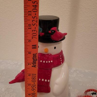Lot 204: Snowman Cookie Jar and Cookie Cutters