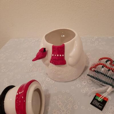 Lot 204: Snowman Cookie Jar and Cookie Cutters