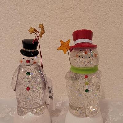 Lot 227: (2) Light up Snowmen (need new batteries)