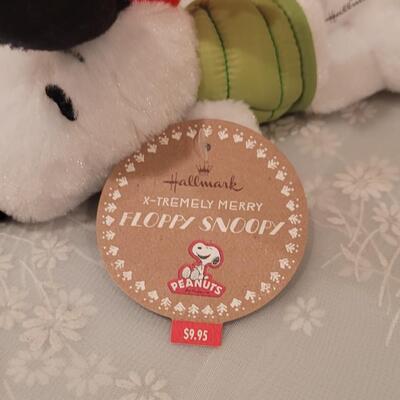 Lot 240: Sweater Snoopy and 2011 Floppy Snoopy 