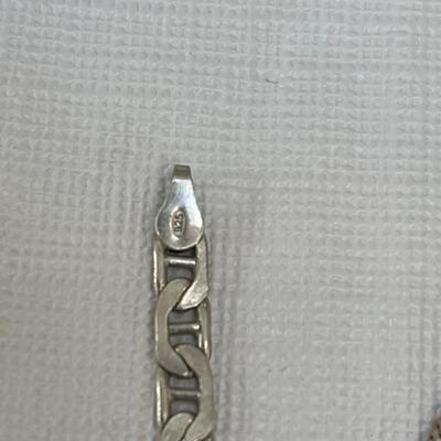 Lot 262 - Sterling Silver Necklace, Earrings, Bracelet and Silver Colored Cross