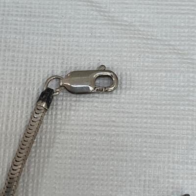 Lot 262 - Sterling Silver Necklace, Earrings, Bracelet and Silver Colored Cross