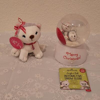 Lot 258: Jingle and Bell Sledding Snow Globe and Plushie