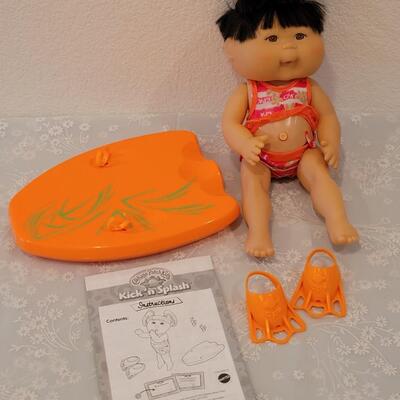 Lot 264: Swimming Cabbage Doll