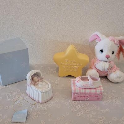 Lot 331: Precious Moments Prayer Bunny, Star Bank, Decorative Shoe and Musiacel Baby in Bassinet 