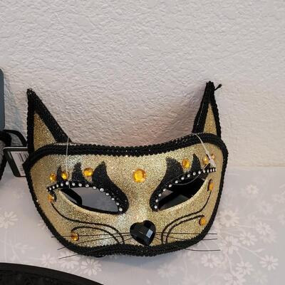 Lot 376: Witch Hat and (2) Cat Masks