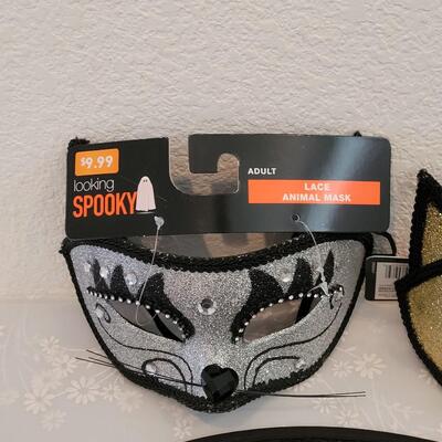 Lot 376: Witch Hat and (2) Cat Masks