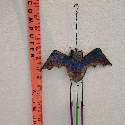 Lot 378: Bat Wind Chime and Candle Holders 