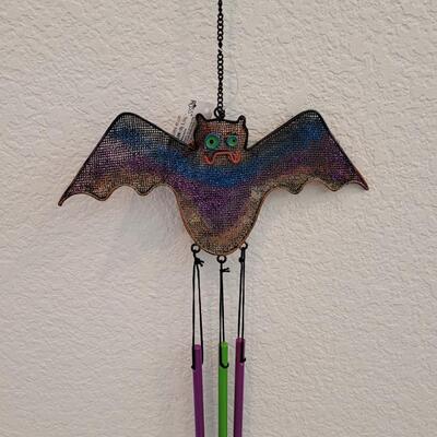 Lot 378: Bat Wind Chime and Candle Holders 