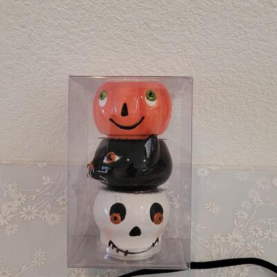 Lot 378: Bat Wind Chime and Candle Holders 