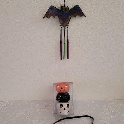 Lot 378: Bat Wind Chime and Candle Holders 