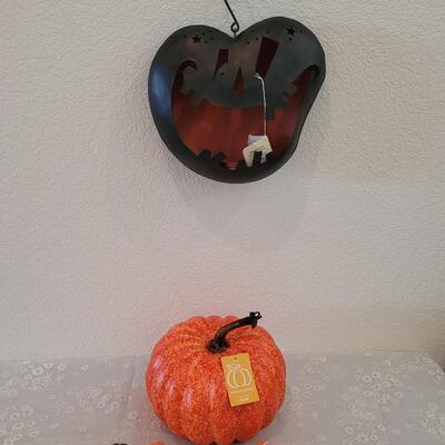 Lot 382: Metal Hanging Luminary Pumpkin, Small Candles and Foam Pumpkin Deco