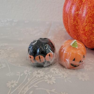 Lot 382: Metal Hanging Luminary Pumpkin, Small Candles and Foam Pumpkin Deco
