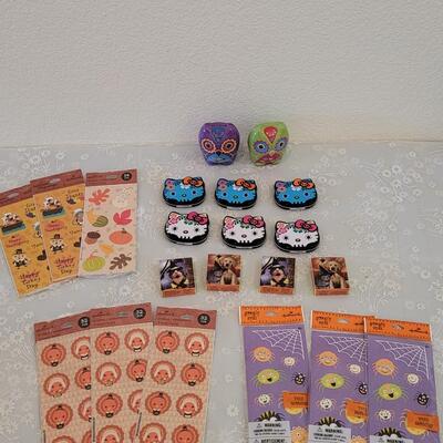 Lot 389: Holiday Stickers and Hello Kitty Candy Tins