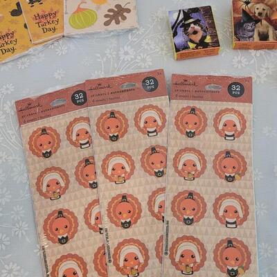 Lot 389: Holiday Stickers and Hello Kitty Candy Tins
