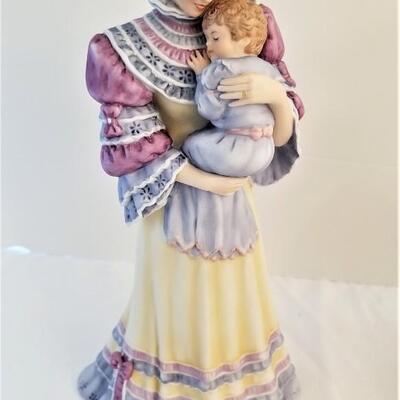Lot #86  Two Lenox Figurines "Belle of the Ball" and "Cherished Moments"