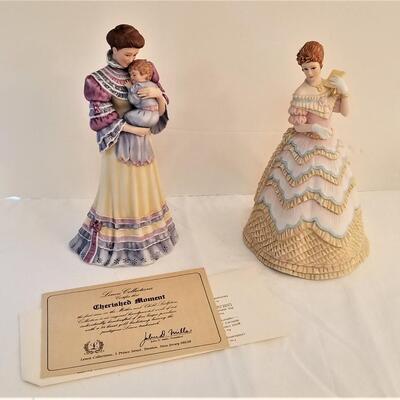 Lot #86  Two Lenox Figurines "Belle of the Ball" and "Cherished Moments"