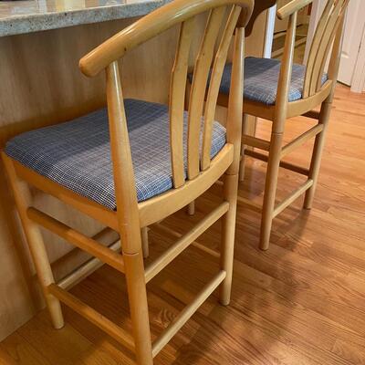 Two bar stools with custom cushions
