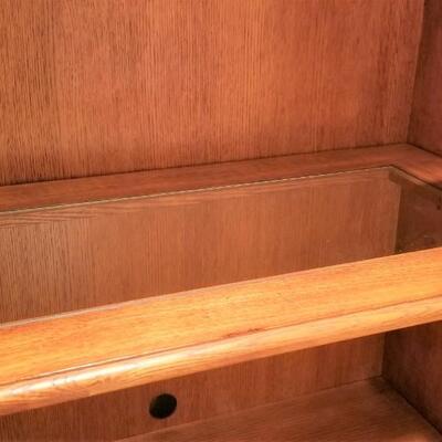 Lot #95  Lighted Contemporary Bookcase with Drawers