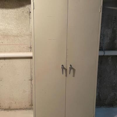 Large standing metal cabinet