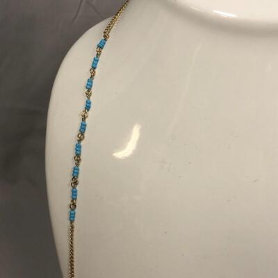 Lot 173 - Long Gold Tone with Blue Beads Necklace