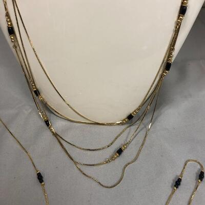 Lot 176 - (2) Gold Tone Necklaces with Black Beads