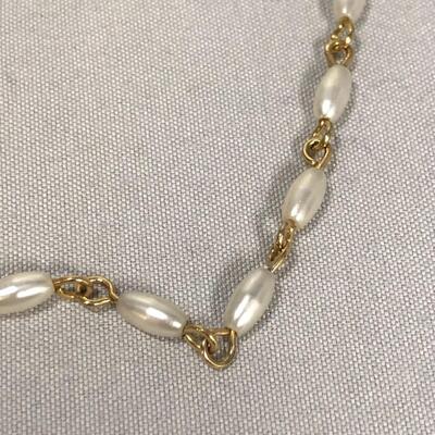 Lot 182 - Long White Bead and Gold Tone Link Necklace