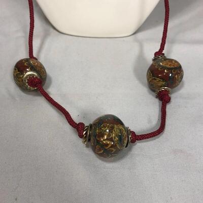 Lot 187 - Large Bead on Rope Necklace