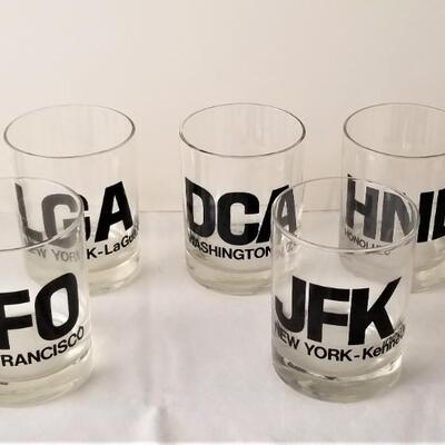 Lot #3  Cool set of vintage bar glasses with Airport Symbols on them