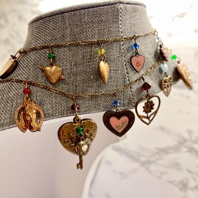 Lot 22  String of Hearts Memory Charm Necklace 