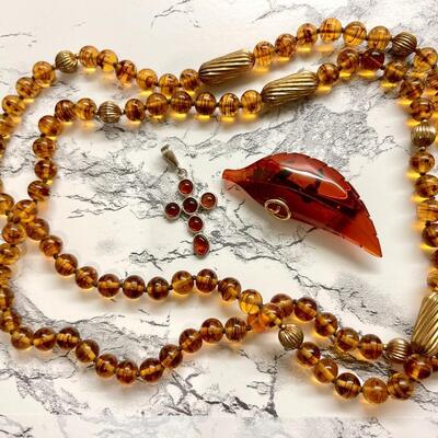 Lot 31  Group of Baltic Amber & Glass Jewelry