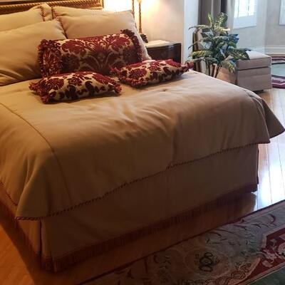 Queen Bed With Tan Linens/Pillows and Headboard--No Mattresses Included