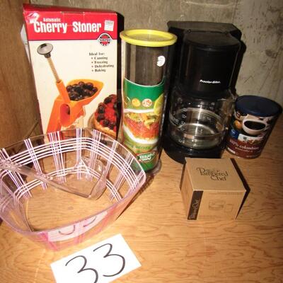 LOT 33 CHERRY STONER, PAMPERED CHEF & MORE