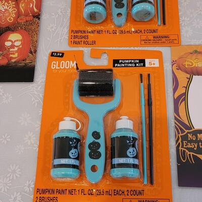 Lot 29: Pumpkin Carving Set. Pumpkin Paints, Pumpkin Tattoos, Stencils and Flannel Backed Disposable Tablecloth 