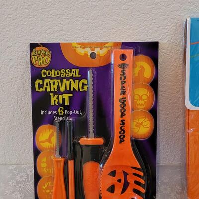 Lot 29: Pumpkin Carving Set. Pumpkin Paints, Pumpkin Tattoos, Stencils and Flannel Backed Disposable Tablecloth 