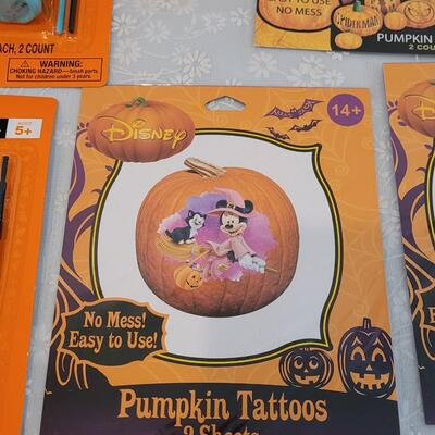 Lot 29: Pumpkin Carving Set. Pumpkin Paints, Pumpkin Tattoos, Stencils and Flannel Backed Disposable Tablecloth 