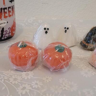 Lot 46: (8) Halloween Candles and Luminary Jar 