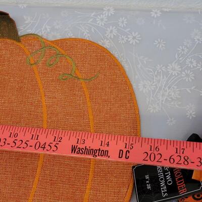 Lot 54: Pumpkin Table Mat, Oven Mit and Dish Towels 