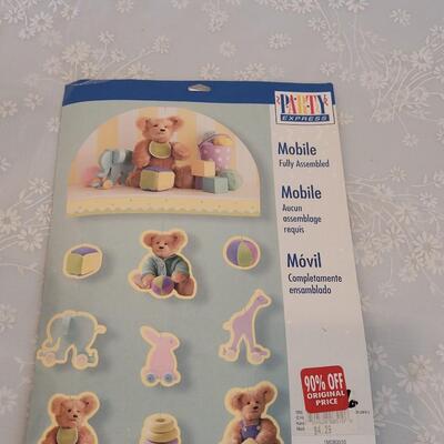 Lot 100: (2) Baby Plushies and a Mobile