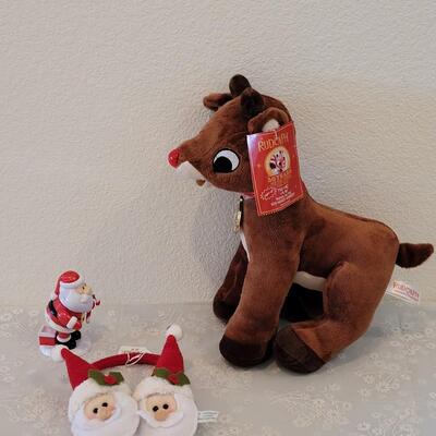 Lot 109: Animated Rudolph, Pooping Santa and Santa Earmuffs