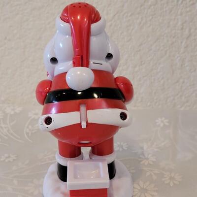 Lot 109: Animated Rudolph, Pooping Santa and Santa Earmuffs