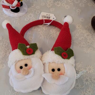 Lot 109: Animated Rudolph, Pooping Santa and Santa Earmuffs