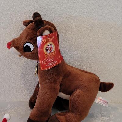 Lot 109: Animated Rudolph, Pooping Santa and Santa Earmuffs