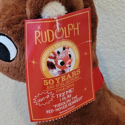 Lot 109: Animated Rudolph, Pooping Santa and Santa Earmuffs