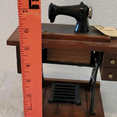 Lot 111: Antique Sewing Machine Music Box