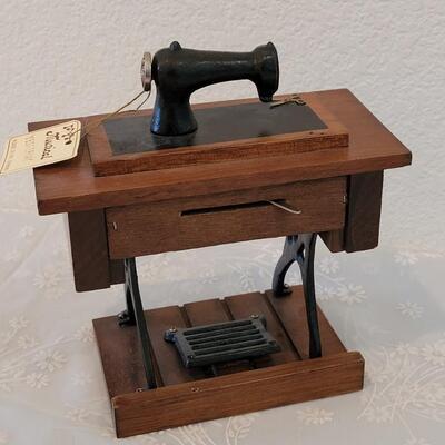 Lot 111: Antique Sewing Machine Music Box