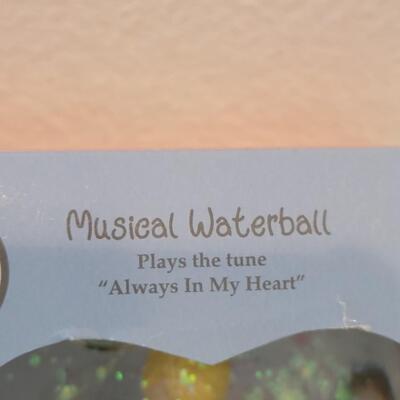 Lot 112: Precious Moments Waterball and Angel LED Musical Tabletop  