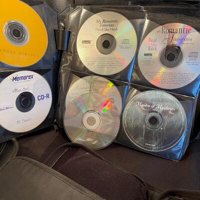#490 Books of C D' s - All Partially full At Least a count of 100 CD's